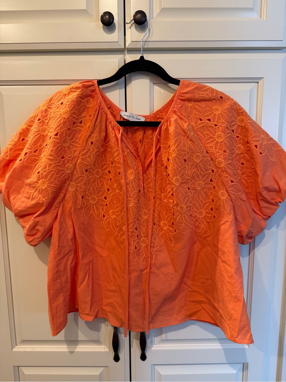 Jacquie the Label Orange Puff Sleeve Floral Eyelet Tie Neck Top